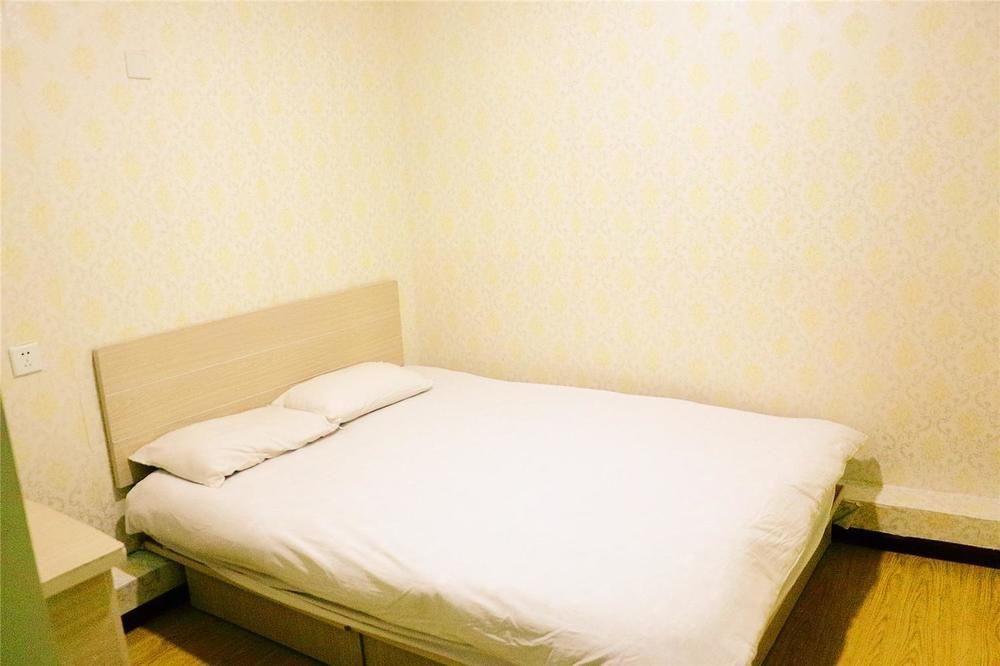 Qingdao Peninsula Four Seasons Business Hotel Esterno foto